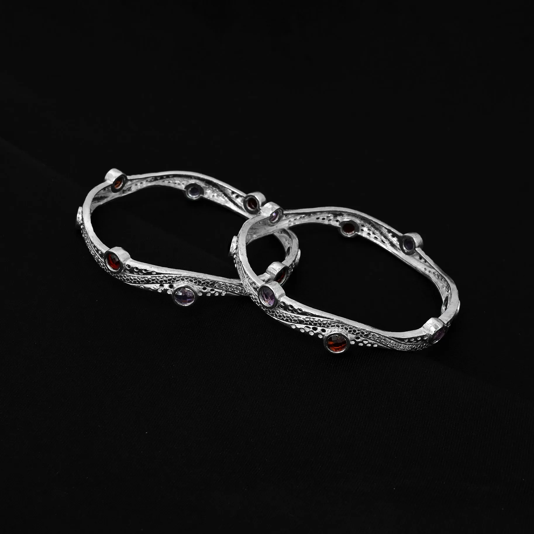 Add a Touch of Grace to Your Look with Our Stunning Silver Bangle