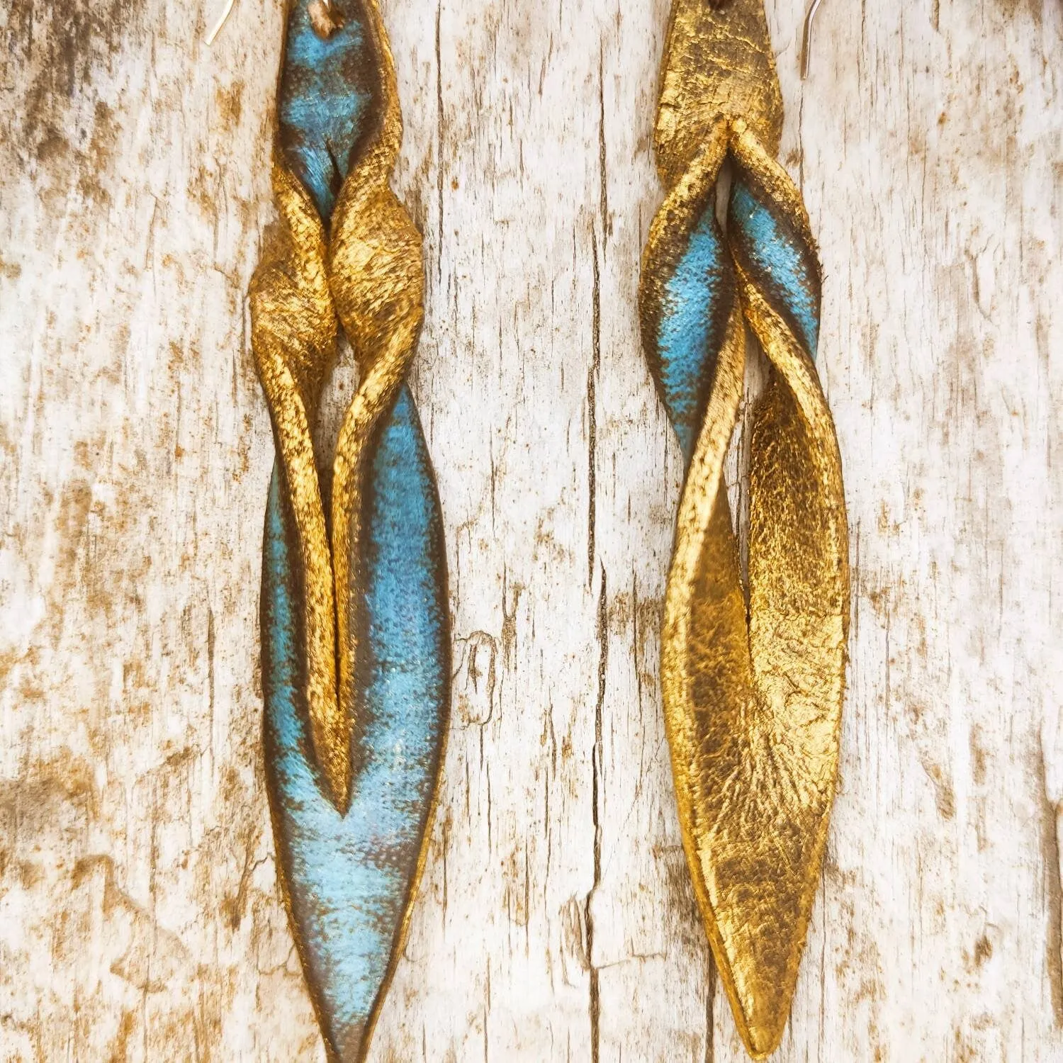 Handmade turquoise leather earing with brown wash and gold, you can wear it in both sides, you get two beautiful earings in one.