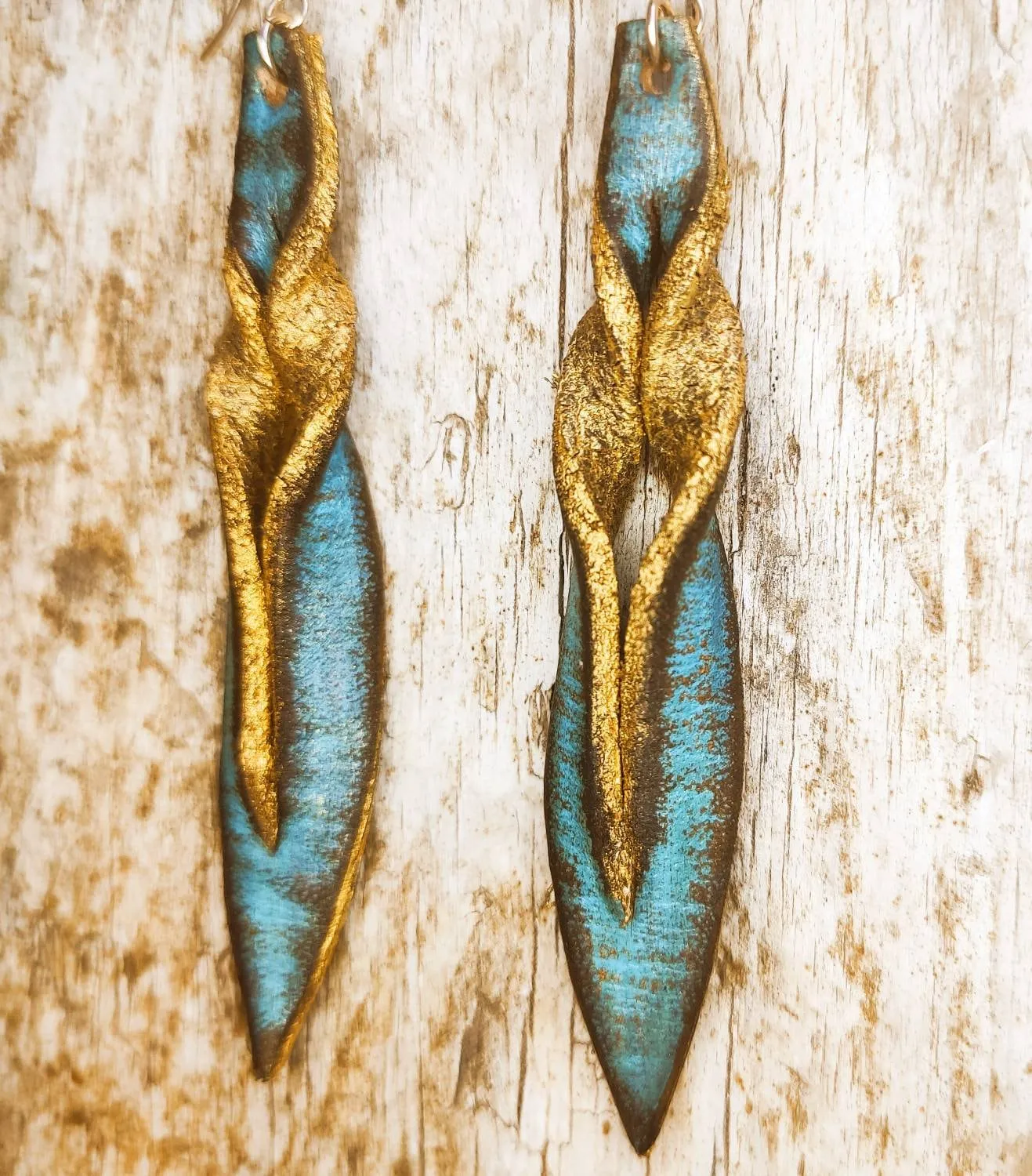 Handmade turquoise leather earing with brown wash and gold, you can wear it in both sides, you get two beautiful earings in one.