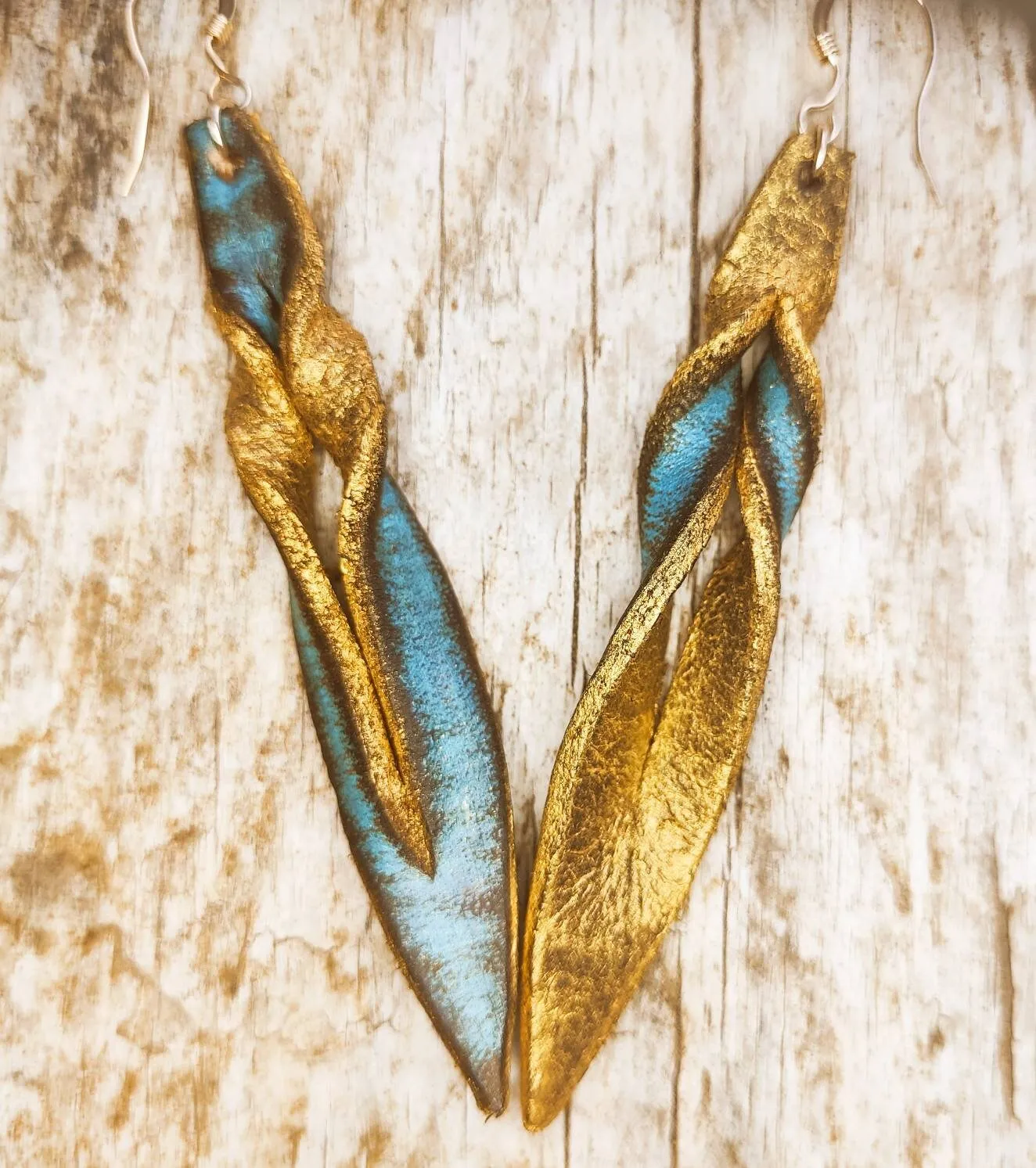 Handmade turquoise leather earing with brown wash and gold, you can wear it in both sides, you get two beautiful earings in one.