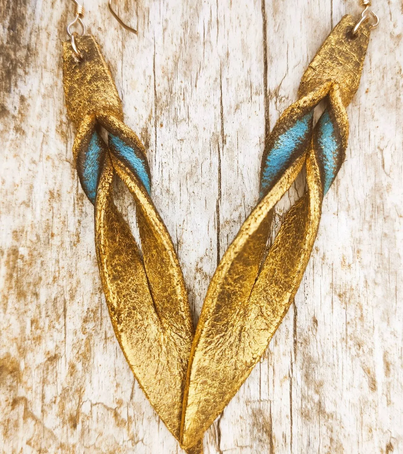 Handmade turquoise leather earing with brown wash and gold, you can wear it in both sides, you get two beautiful earings in one.