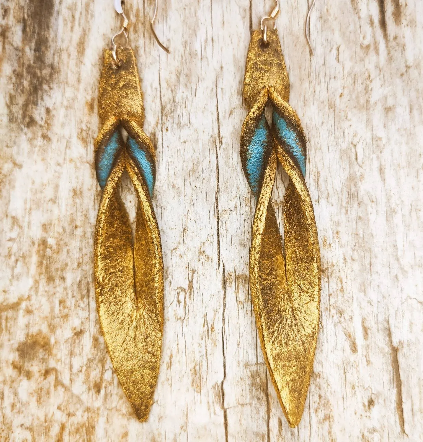 Handmade turquoise leather earing with brown wash and gold, you can wear it in both sides, you get two beautiful earings in one.