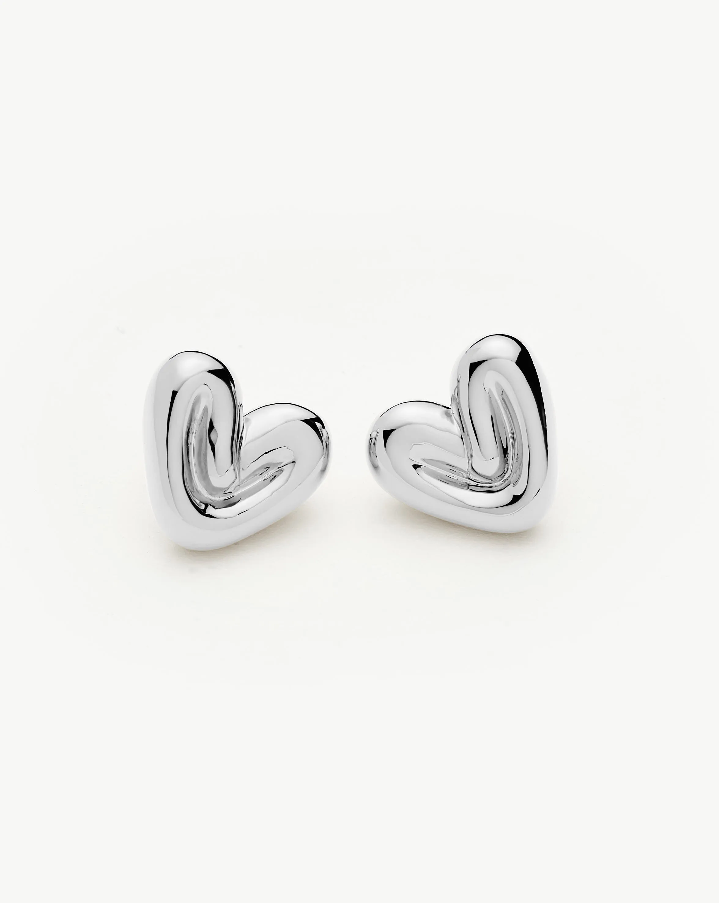 Puffy Heart Stud Earrings in Silver