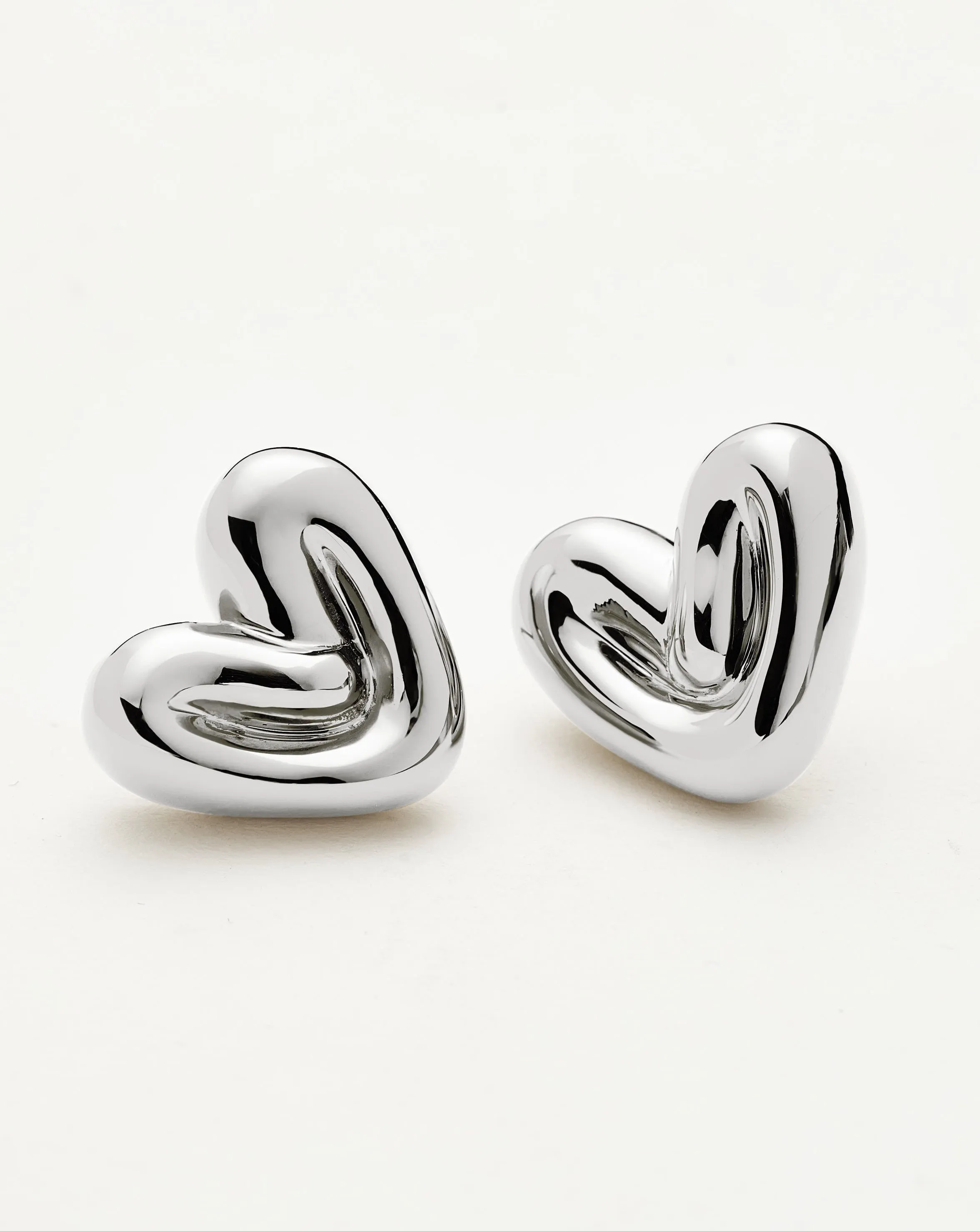 Puffy Heart Stud Earrings in Silver